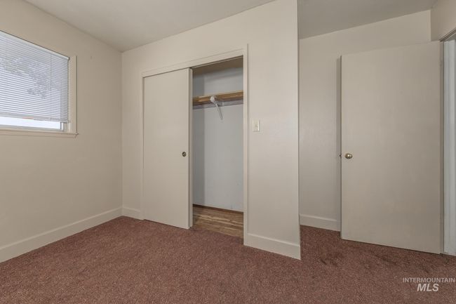 Unfurnished bedroom featuring carpet and a closet | Image 22