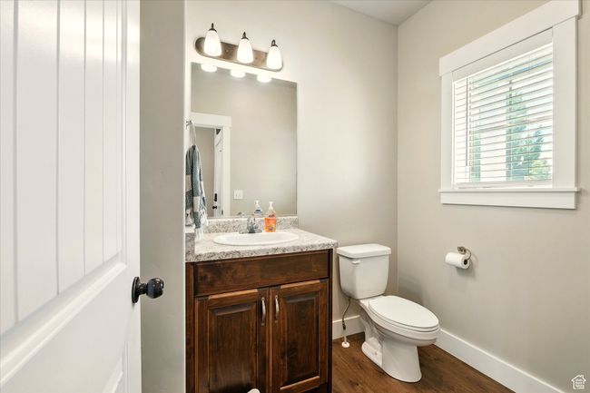 Bathroom featuring wood finished floors and vanity | Image 11