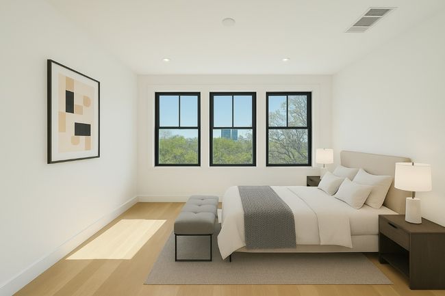 Virtually staged bedroom on the main level with walk in closet | Image 19
