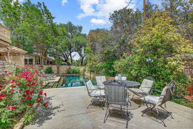 another patio next to the pool | Image 32