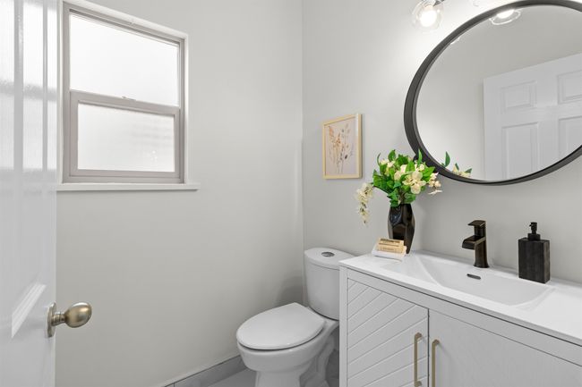 Bathroom with vanity and toilet | Image 25