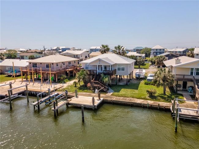 View of dock with a deck with water view, and stairs | Image 6