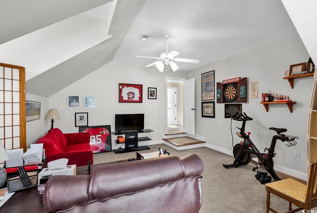 Bedroom featuring carpet floors, ornamental molding, and ceiling fan | Image 31