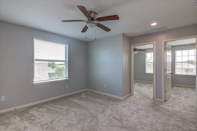 Loft area. Ceiling fans in each room. | Image 21