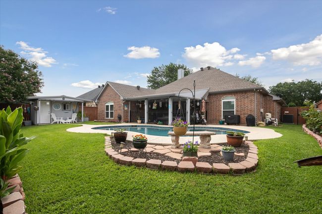 View of pool featuring a patio | Image 29