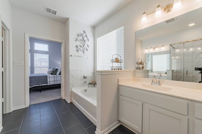 Primary bathroom with dual vanities | Image 15