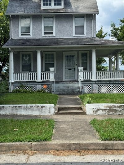 View of front facade with covered porch | Image 1