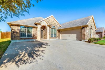 Ranch-style home with a garage | Image 2