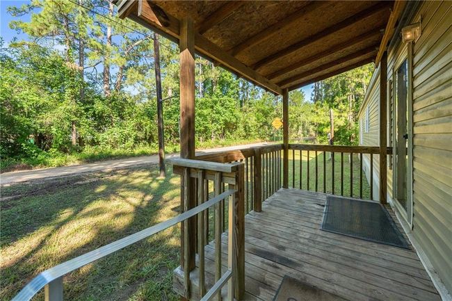 Wooden terrace with a lawn | Image 31