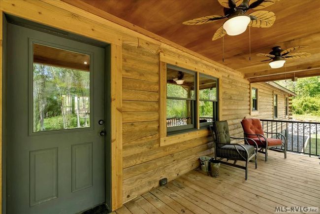 Lakeside porch with more ceiling fans | Image 8