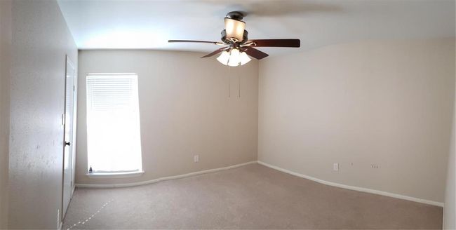 Bedroom #1 sits next to full batroom. It has ceiling fan for added cooling. Large walk-in closet. | Image 6