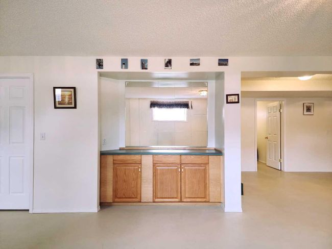 401 Slade Place, Home with 3 bedrooms, 2 bathrooms and 4 parking in Nanton AB | Image 25