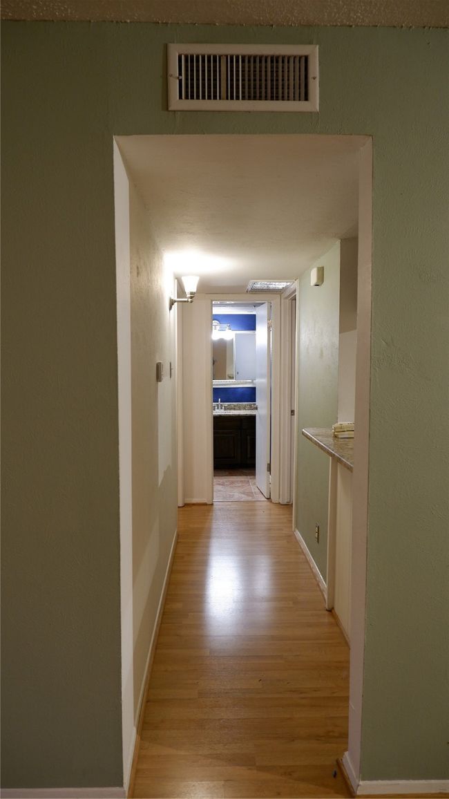 Hall featuring light hardwood / wood-style floors | Image 8