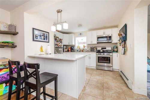 108 Atlantic Ave, Long Beach, NY, 11561-3805 | Card Image