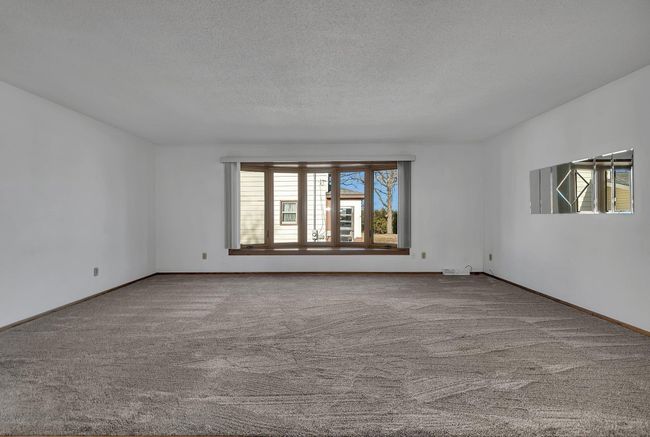 Large Main Floor Living Room with new windows and newer carpet (2024) | Image 7
