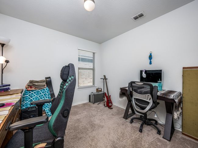 Office area with carpet floors and baseboards | Image 23
