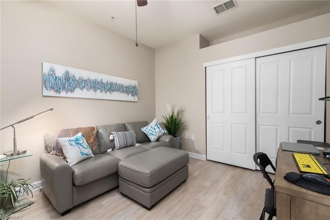Living room with light hardwood / wood-style floors | Image 14