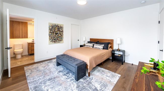 This primary bedroom has a walk-in closet and full bath attached. | Image 24