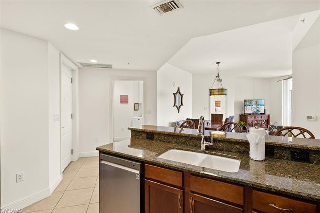 Kitchen over looking the entire living space! | Image 18