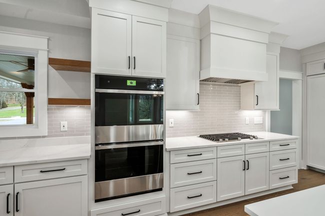 Double Ovens, gas cooktop and vented hood | Image 17