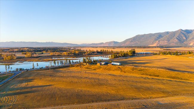 View of mountain feature featuring a rural view and a water view | Image 63