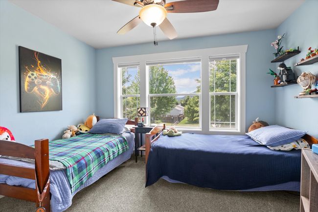 2nd floor 3rd bedroom with views of mature trees and Lone Pine Mountain | Image 24