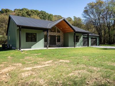 Exterior siding is metal board and batten, metal roof, so any maintenance will be minimum. | Image 3