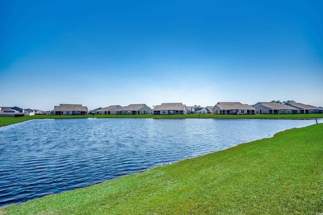 Property view of water featuring a residential view | Image 9