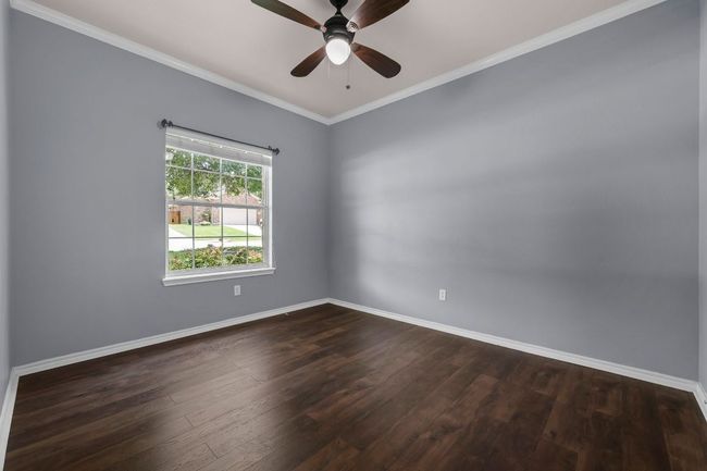 Three additional bedrooms offer flexibility for family, guests, or home office needs—the fourth bedroom is ideal as a study or workspace. | Image 25