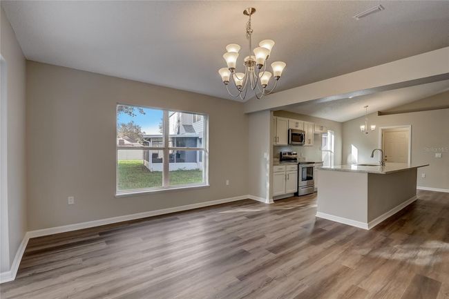 3843 Cinnamon Fern Loop, House other with 4 bedrooms, 2 bathrooms and null parking in CLERMONT FL | Image 5