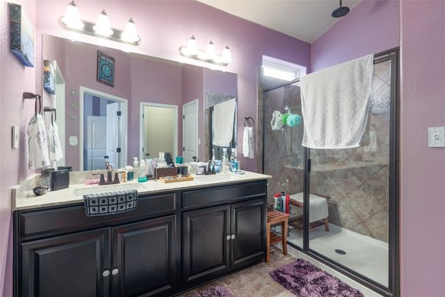 Full bath featuring a stall shower and double vanity | Image 17