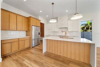 Gourmet Kitchen with waterfall island | Image 2