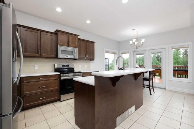 118 Mayflower Bay, House other with 4 bedrooms, 4 bathrooms and 4 parking in Fort Mcmurray AB | Image 4