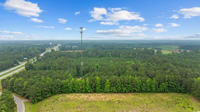 Bird's eye view of a heavily wooded area | Image 13
