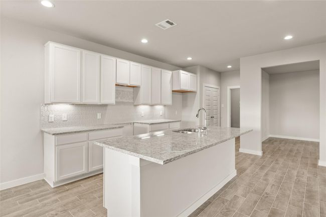This photo is for illustrative purposes only and is not to be considered an exact replica of the finished home. Rendering does not match the finished product in terms of features, colors, landscaping, etc. Pricing, specifications, square footage and materials are subject to change at any time and without notice. | Image 5
