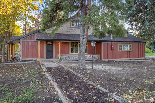 View of front of home featuring a shingled roof | Image 9