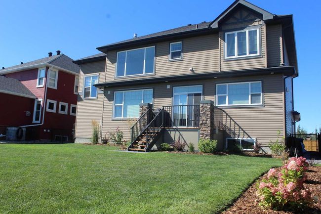 312 Boulder Creek Cres Se, House other with 3 bedrooms, 3 bathrooms and 6 parking in Langdon AB | Image 32