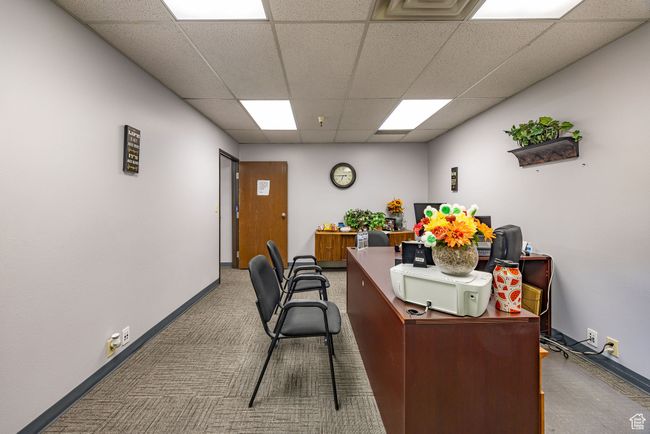 Home office featuring a paneled ceiling and carpet | Image 18