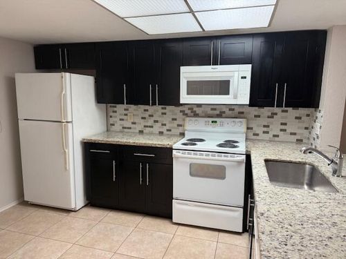 104-104 Palm Beach Trace Dr, Royal Palm Beach, FL, 33411-1254 | Card Image