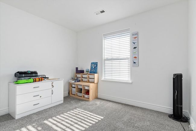 Interior space featuring light colored carpet | Image 22