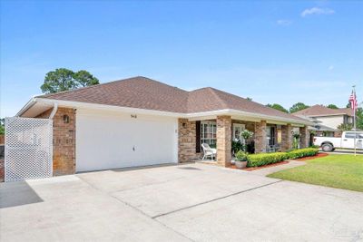 9418 Pouder Ln, House other with 5 bedrooms, 3 bathrooms and 2 parking in Navarre FL | Image 3