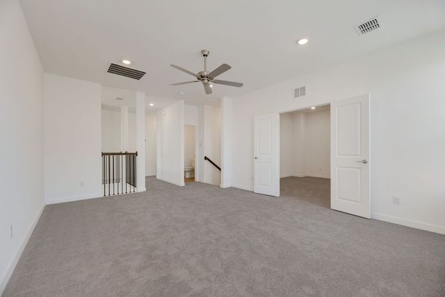 Unfurnished room with carpet, recessed lighting, and a ceiling fan | Image 14
