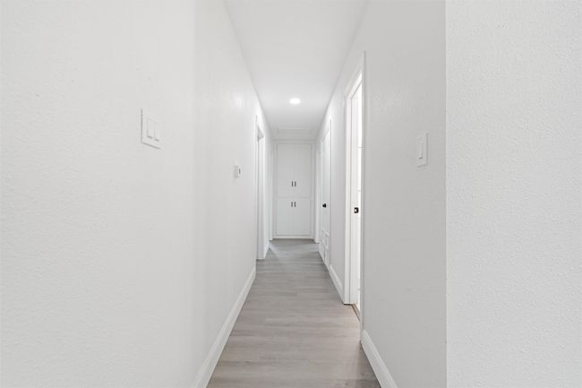 Corridor featuring light wood-type flooring | Image 21