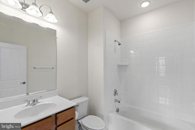 10720 Shadewell Spring Way, Townhouse with 3 bedrooms, 4 bathrooms and null parking in MANASSAS VA | Image 12