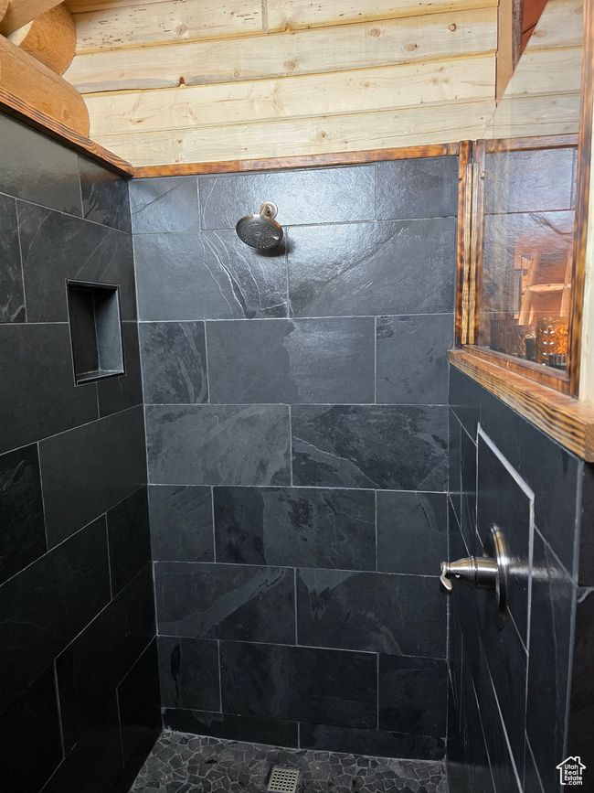 Bathroom with a tile shower | Image 85
