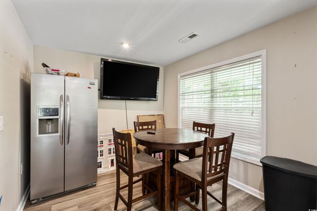 Dining room featuring light wood finished floors and baseboards | Image 18