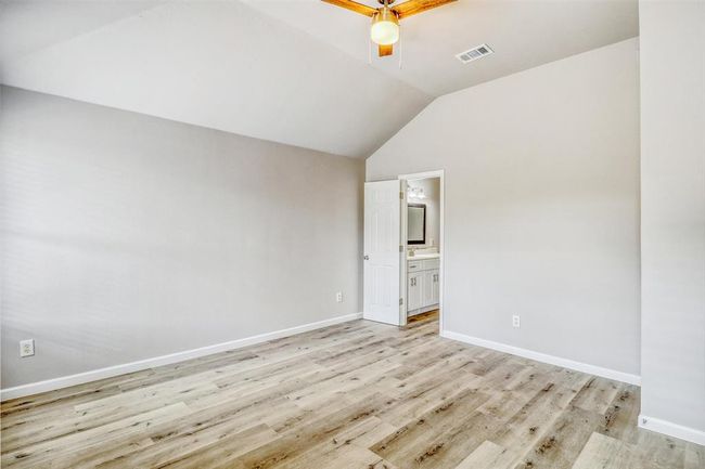 There’s ample space for your full king-size bedroom set, making this room as functional as it is comfortable. Just ahead, your private ensuite bathroom awaits! | Image 21