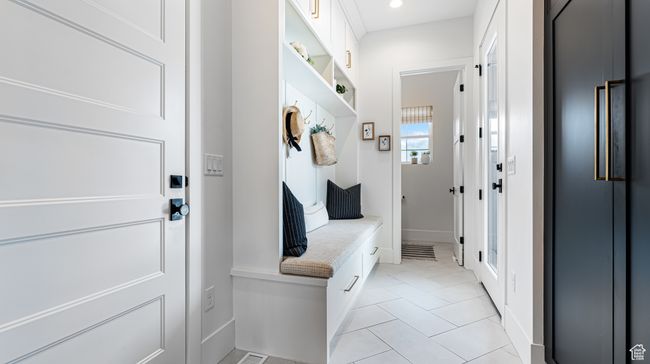 Mudroom with recessed lighting, baseboards, and light tile patterned floors | Image 27