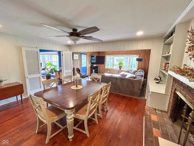 Spacious dining room including fireplace | Image 11