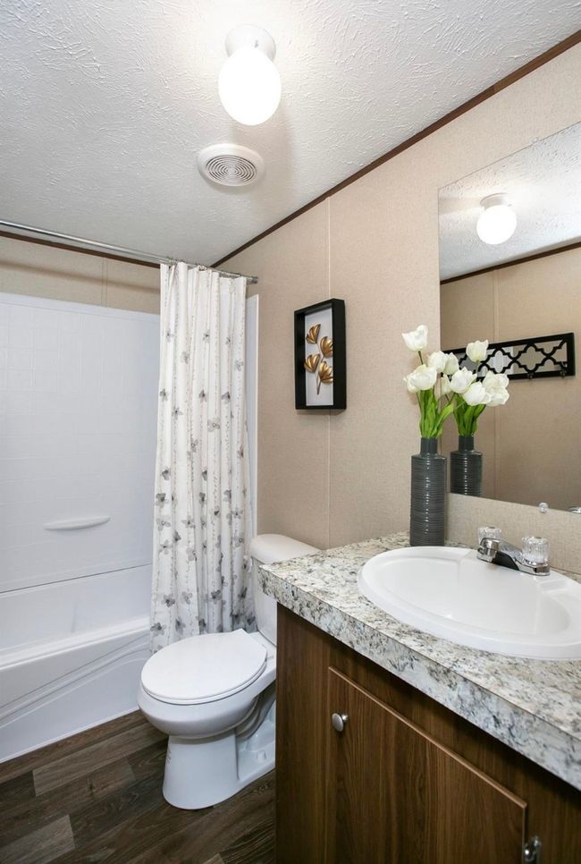 Full bath with visible vents, toilet, a textured ceiling, and wood finished floors | Image 11